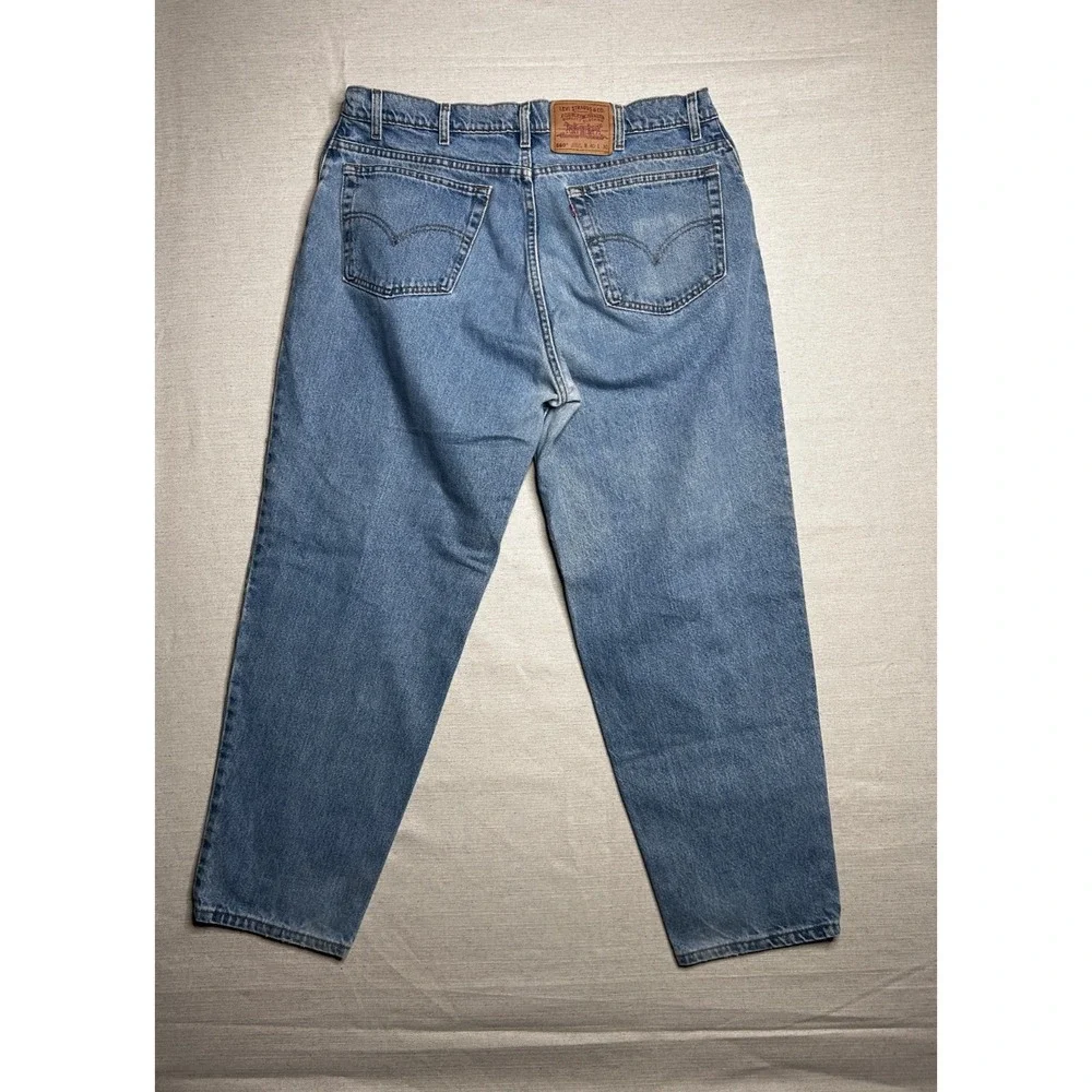 Vintage Levi's 560 Loose Fit Jeans Men's 40x30 USA Made Tapered Leg Light Wash